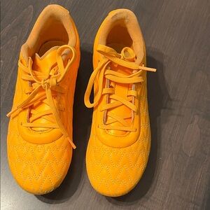 Under Armour Kids Cleats in Bright Orange